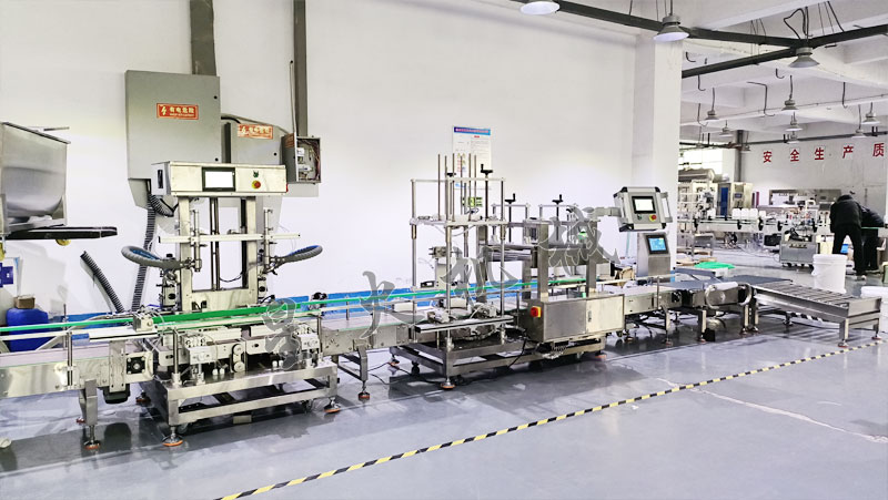 电子定量称重灌装机生产线-油墨灌装扣盖压盖贴标检重